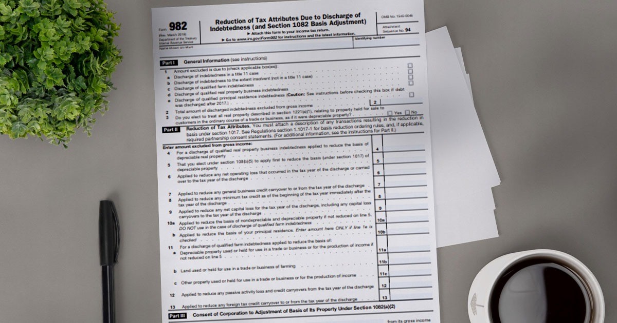 IRS Form 982, a tax form used for filing taxes, is displayed on a white background with clear text and sections.
